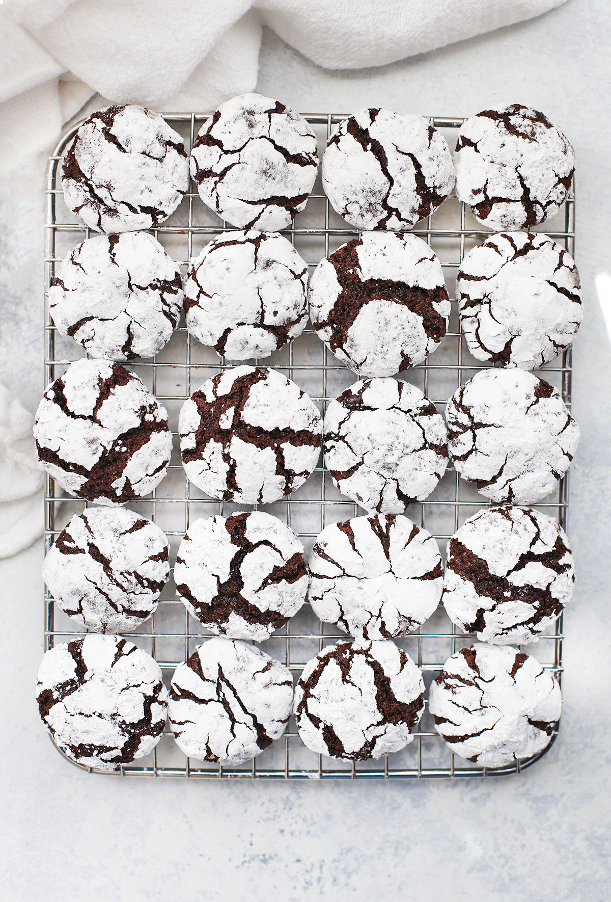Overhead view of Gluten Free Chocolate Crinkle Cookies on a cooling rack