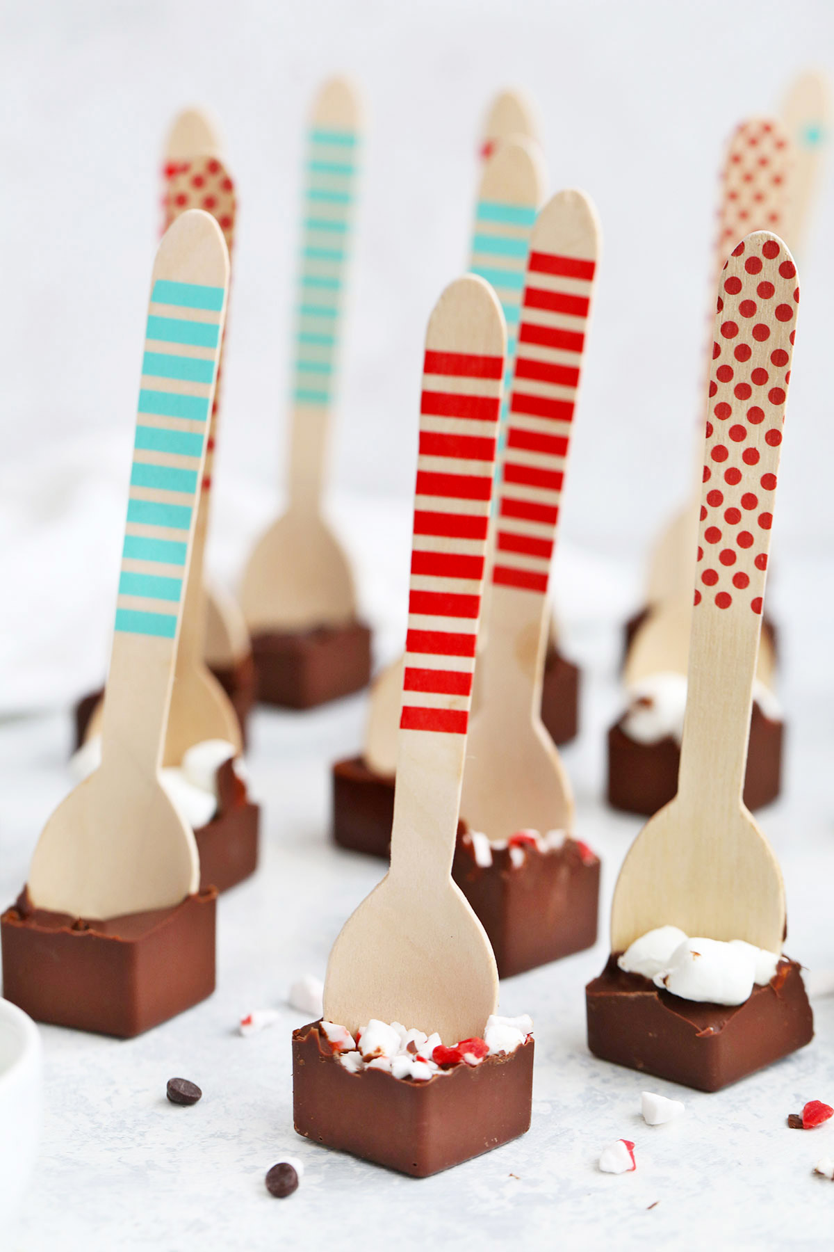 Close up view of Dairy free, paleo, vegan hot chocolate spoons on a white background