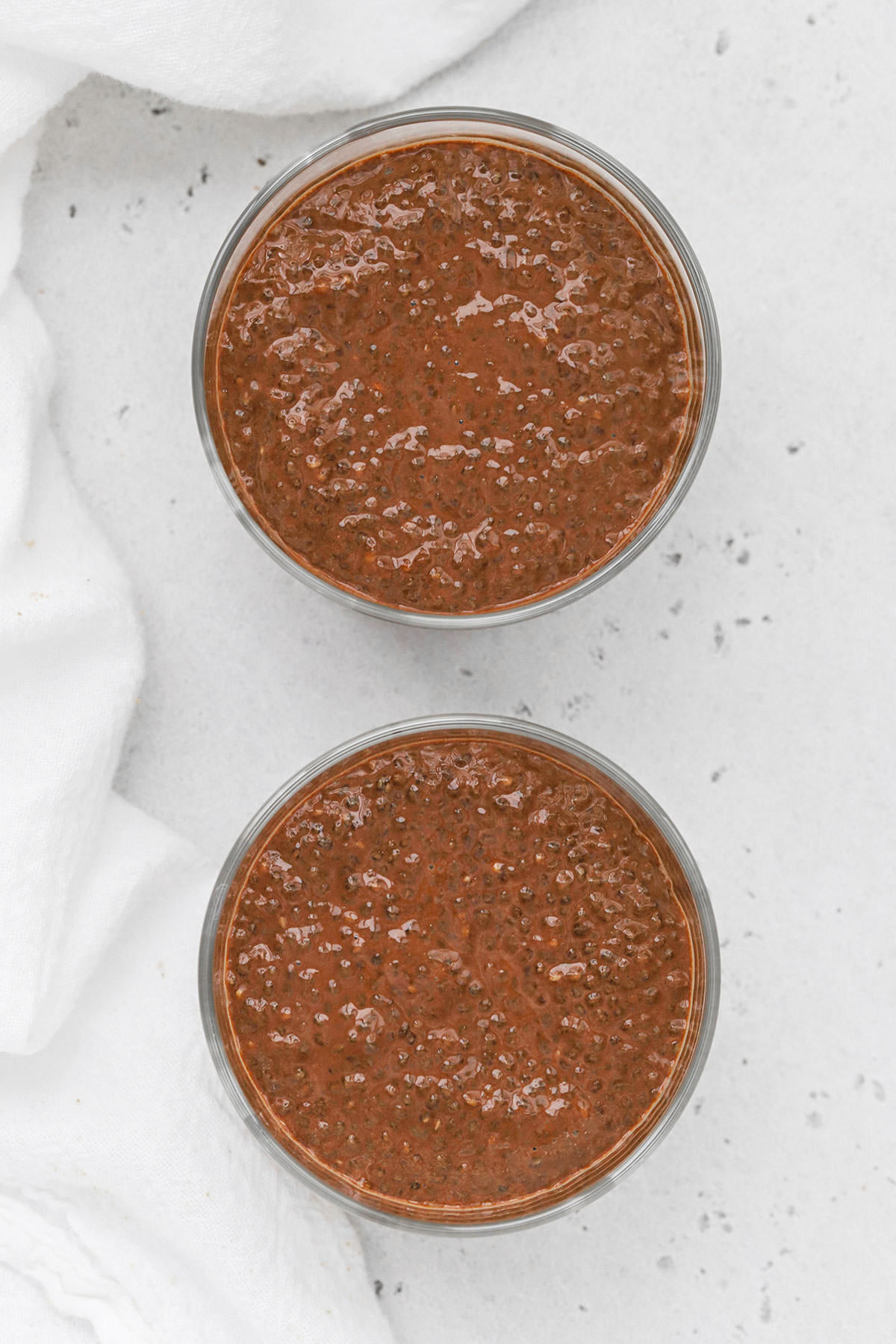 Two bowls of chocolate chia pudding