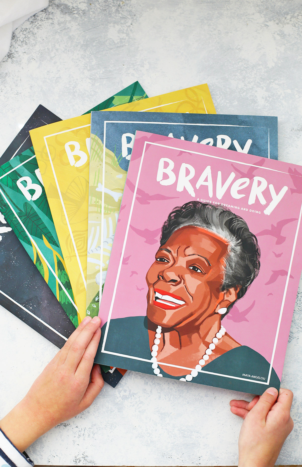 Overhead view of Bravery magazines on a white background
