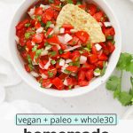 Overhead view of a bowl of authentic pico de gallo with chips with text overlay that reads "vegan + paleo + whole30 homemade pico de gallo: quick + easy + good on everything!"