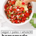 Overhead view of a bowl of authentic pico de gallo with chips with text overlay that reads "vegan + paleo + whole30 homemade pico de gallo: quick + easy + good on everything!"