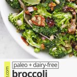 Overhead view of a bowl of broccoli bacon salad with text overlay that reads "paleo + dairy-free broccoli bacon salad with the best dressing!"