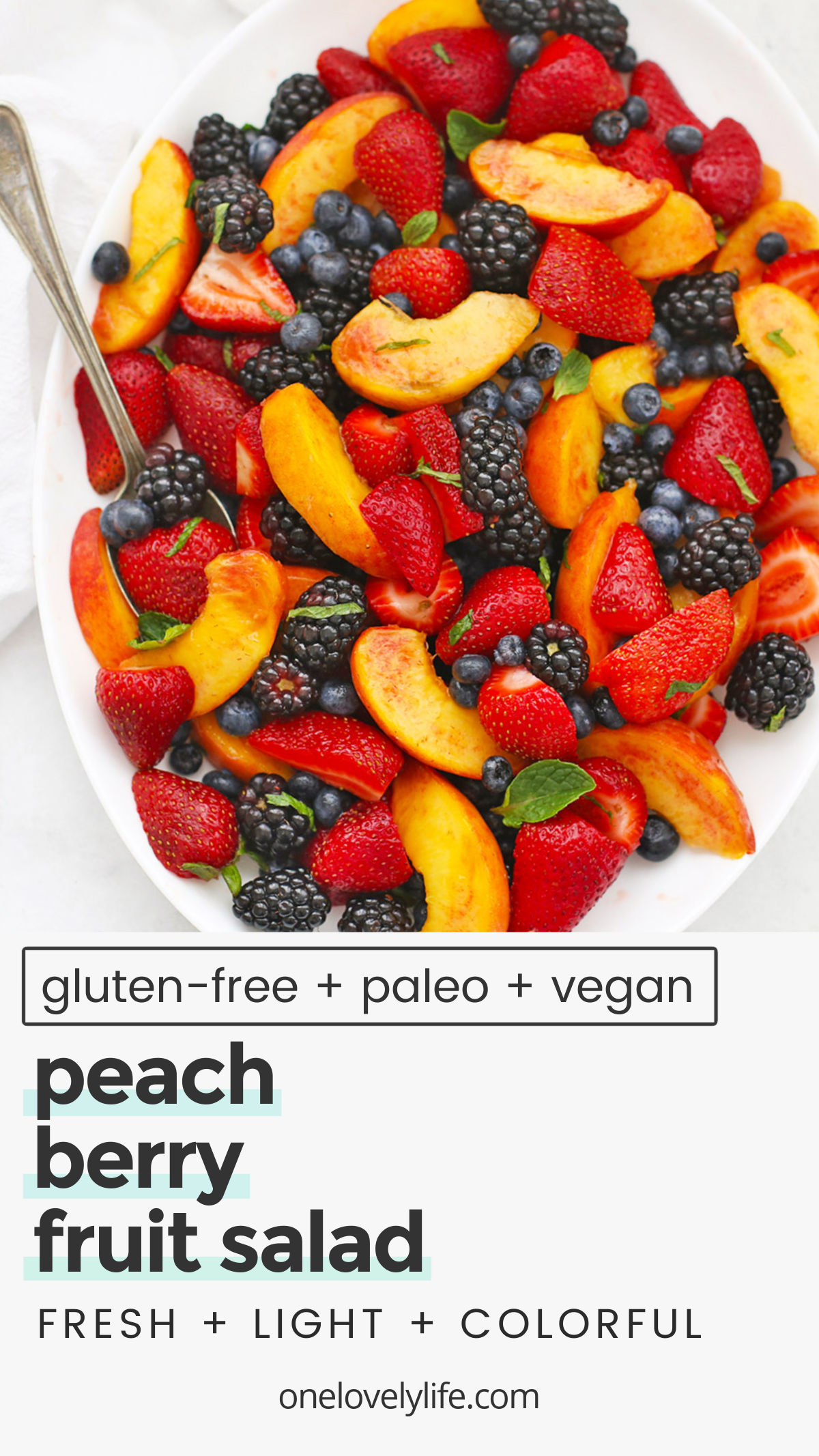 Peach Berry Fruit Salad - This summer fruit salad uses the BEST combination of fresh peaches and berries with a bright, tangy dressing to make a beautiful side dish everyone will love! (Paleo or Vegan) // Peach Fruit Salad Recipe // Summer Fruit Salad Recipe // BBQ Side Dish // Side Salad
