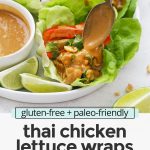Front view of thai chicken lettuce wraps with peanut sauce being drizzled on top with text overlay that reads "gluten-free + paleo-friendly Thai Chicken Lettuce Wraps with the BEST Peanut Sauce"