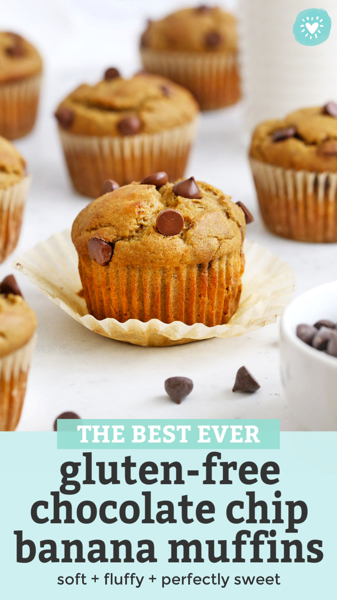 Gluten-Free Chocolate Chip Banana Muffins on a white background with chocolate chips scattered around them, with text overlay that reads "The Best Ever Gluten-Free Chocolate Chip Banana Muffins. Soft + fluffy + perfectly sweet."