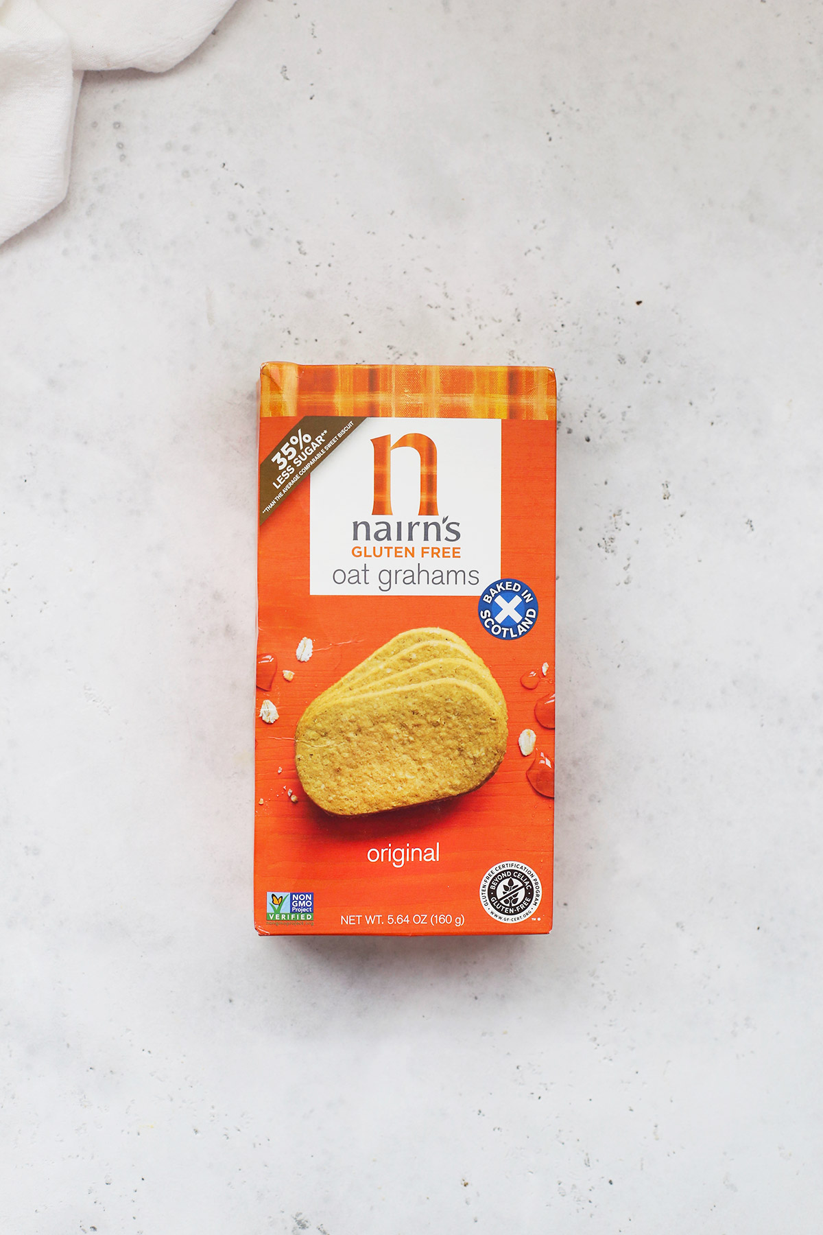 A box of Nairns gluten-free graham crackers on a white background