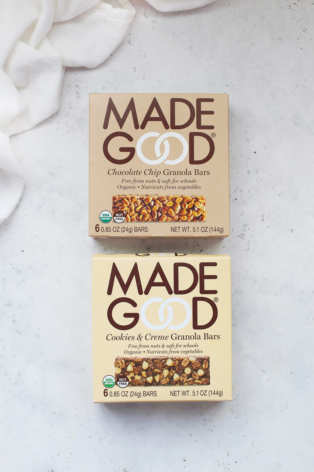 Two boxes of gluten-free Made Good Granola bars on a white background