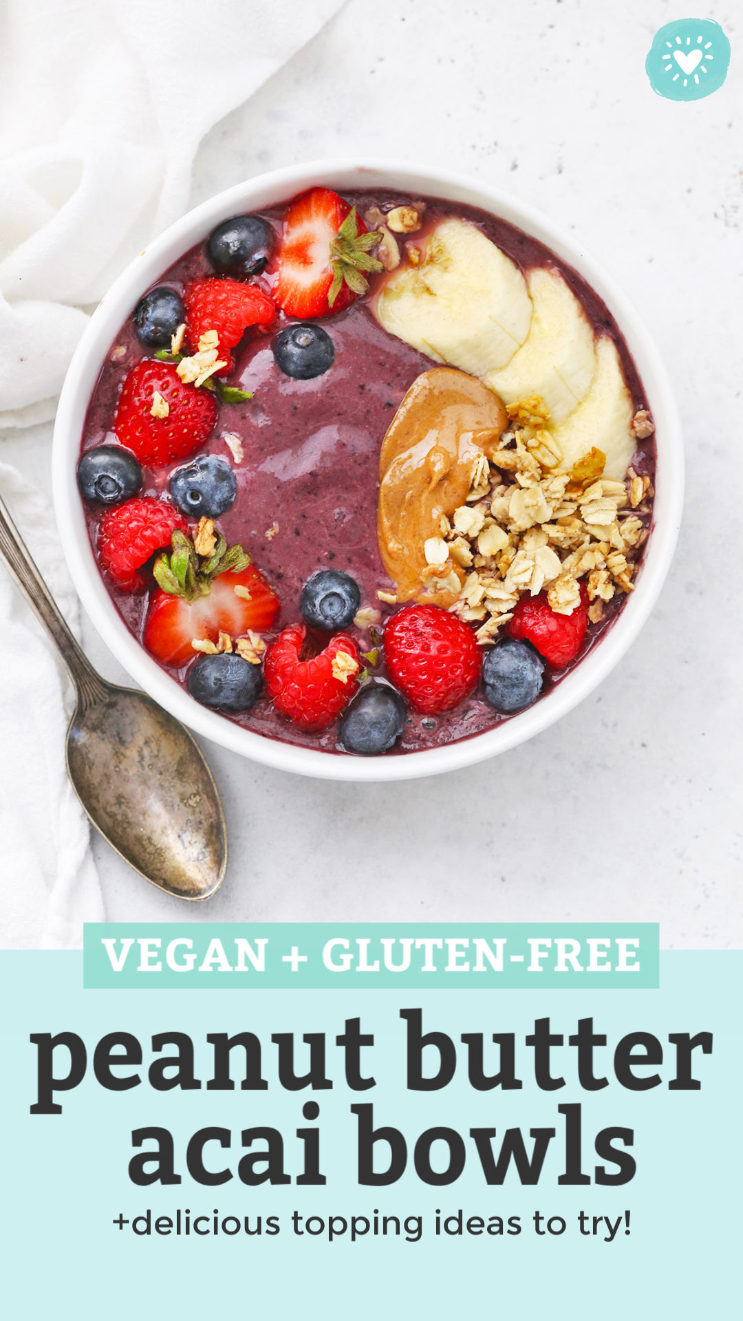 peanut Butter Acai Bowl topped with fresh berries, peanut butter, banana, and granola with text overlay that reads "Vegan + Gluten-Free Peanut Butter Acai Bowls +Delicious Topping Ideas to Try!"