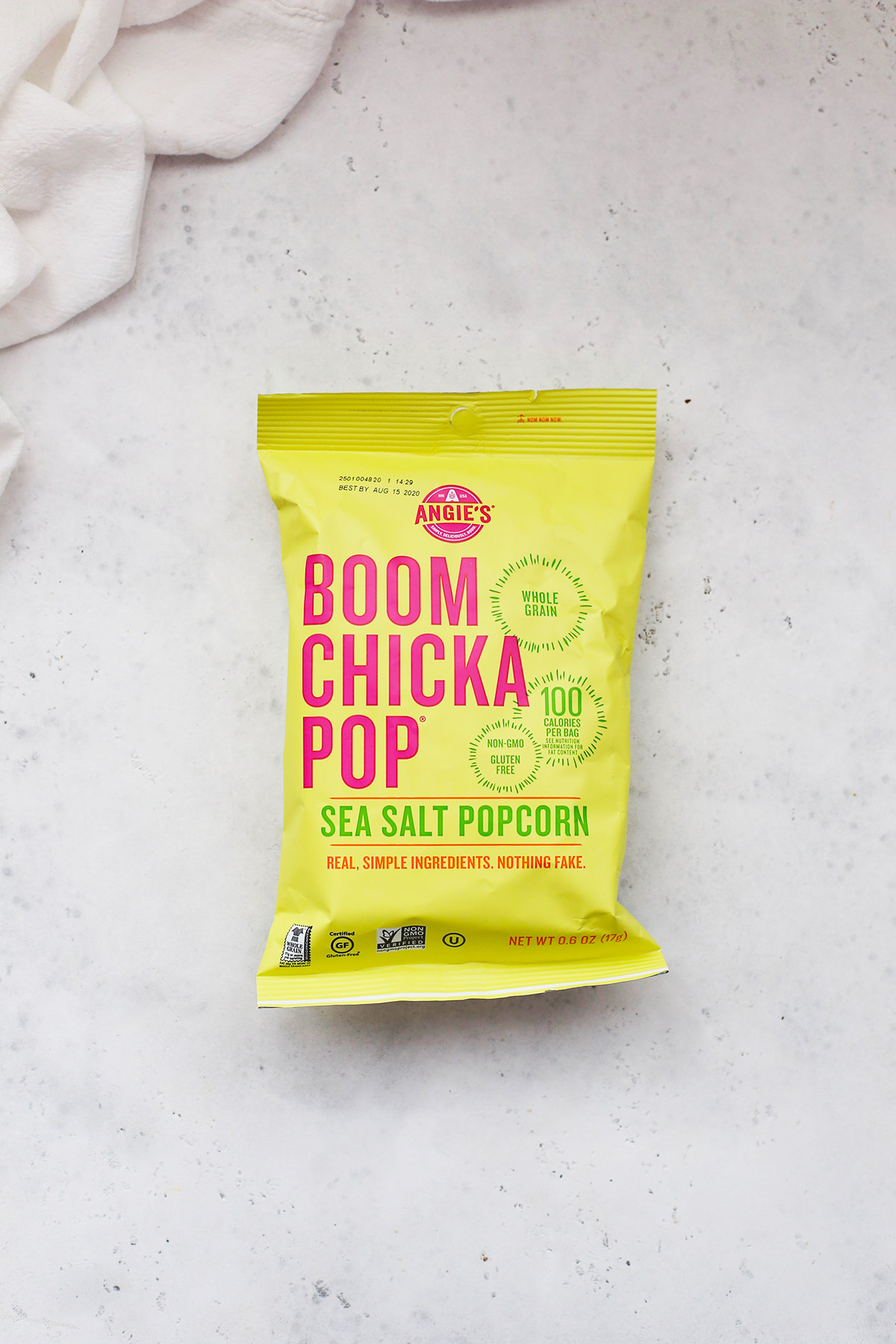 A bag of sea salt boomchickapop popcorn on a white background