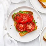 Close up view of Gluten-Free Avocado Toast with Tomatoes.