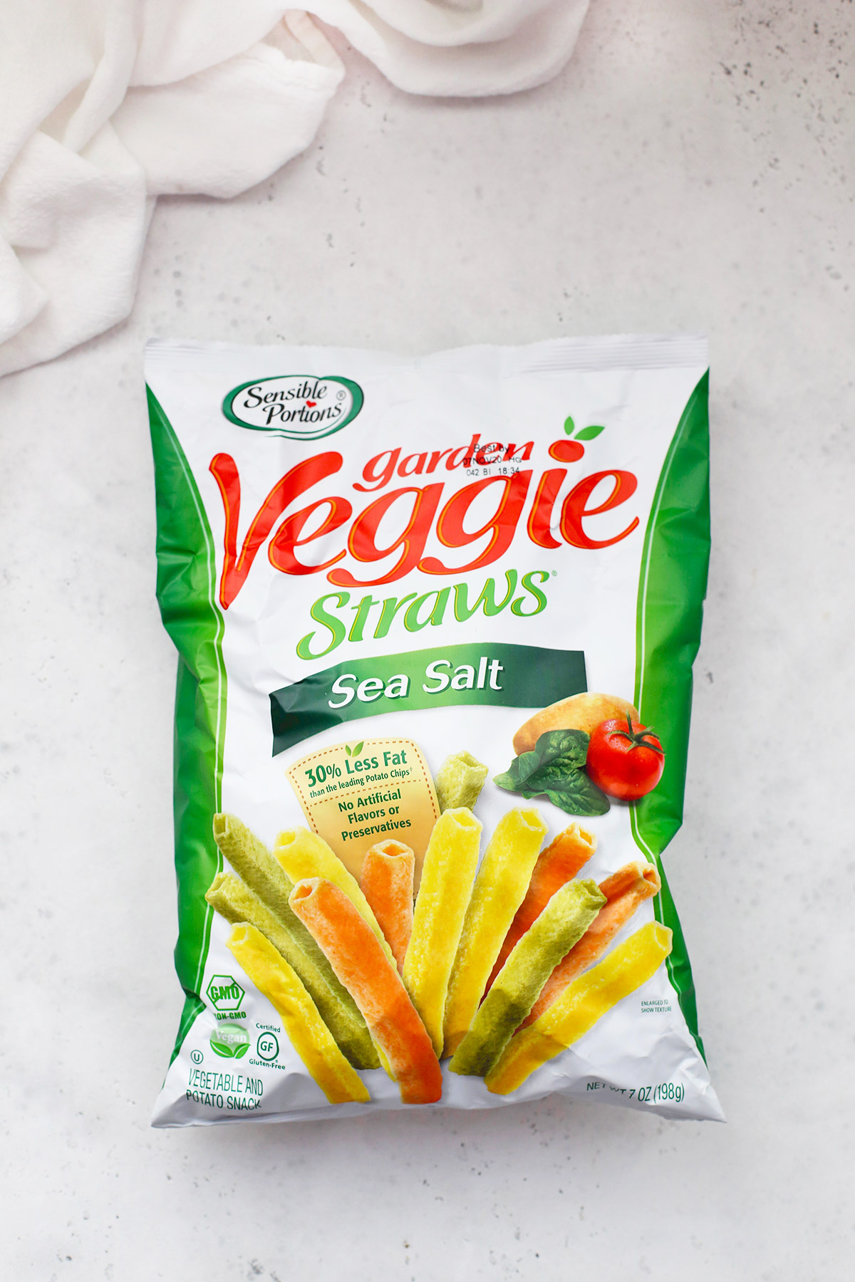 A bag of gluten-free veggie straws on a white background