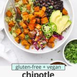 Overhead view of a chipotle sweet potato burrito bowl loaded with black beans, seasoned rice, and avocado with text overlay that reads "gluten-free + vegan Chipotle Sweet Potato Burrito Bowls: So Flavorful + Easy!"