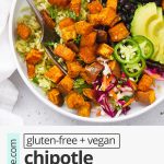 Overhead view of a chipotle sweet potato burrito bowl loaded with black beans, seasoned rice, and avocado with text overlay that reads "gluten-free + vegan Chipotle Sweet Potato Burrito Bowls: Fresh, Flavorful & Family-Friendly"