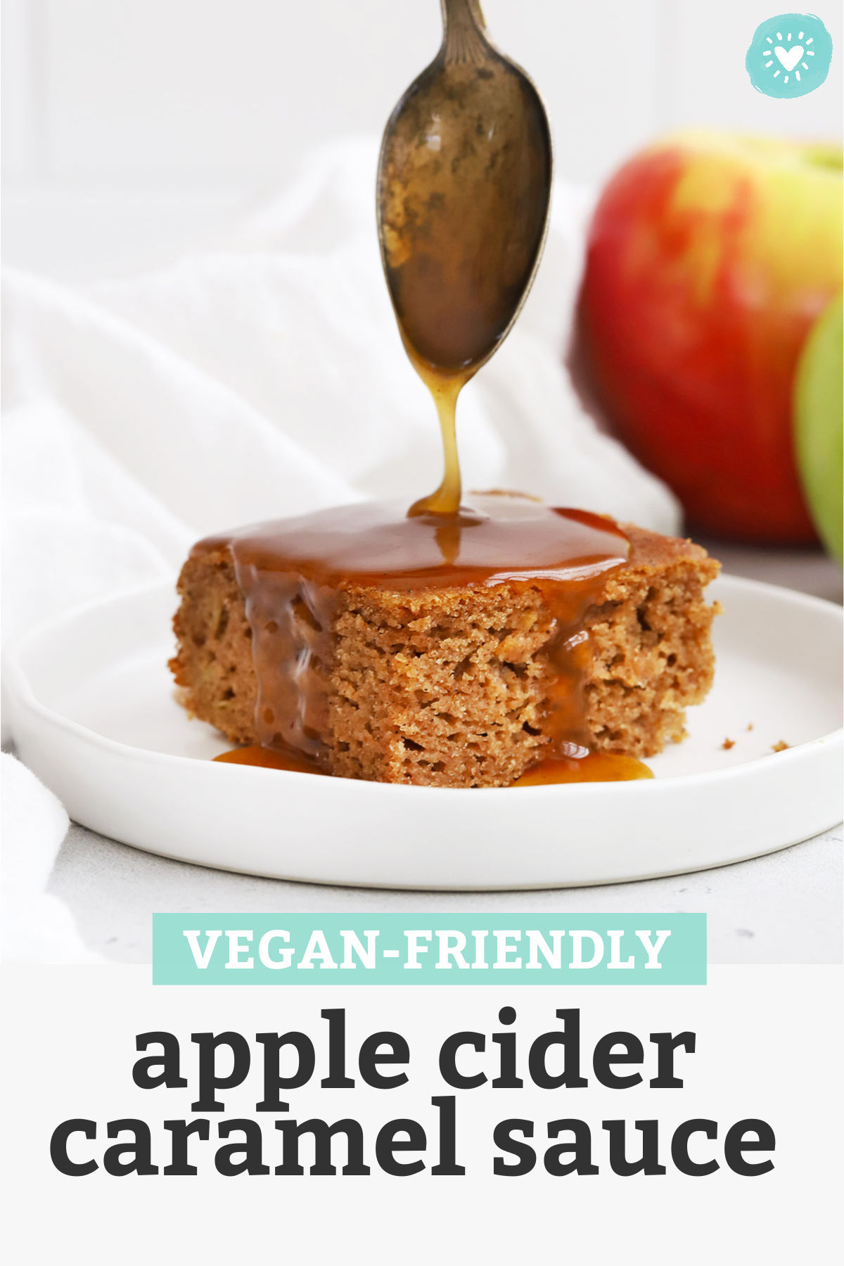 Vegan Cider Caramel Sauce being drizzled over apple spice cake with text overlay that reads "Vegan-Friendly Apple Cider Caramel Sauce"