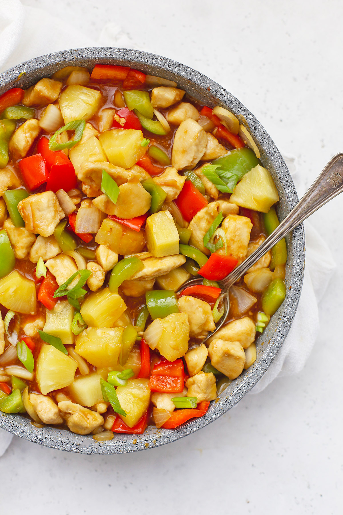 close up view of a pan full of Healthy Sweet and Sour Chicken