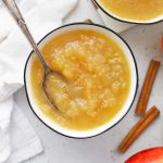 Two servings of Instant Pot Applesauce in white bowls