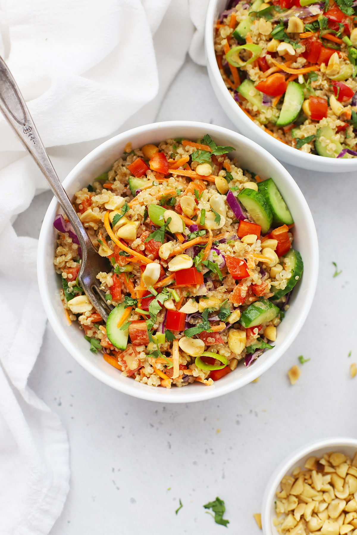Two bowls of Thai Quinoa Salad with Peanut Dressing