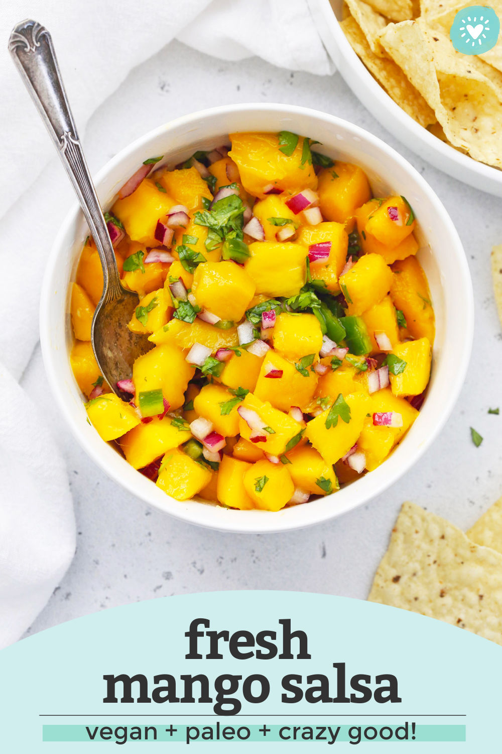 Fresh Mango Salsa - This mango salsa makes just about anything taste better! It's the perfect blend of spicy and sweet. (Naturally gluten-free, vegan, and paleo) // Mango Salsa Recipe // Easy Homemade Salsa // Tex-Mex // Healthy appetizer // Healthy dip // mango recipes // mango salsa for tacos // #mango #mangosalsa #salsa #appetizer #dip