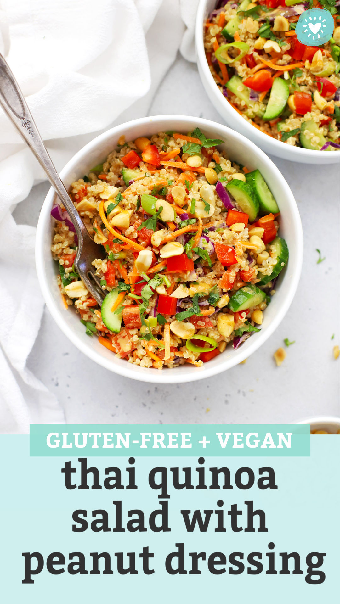 Two bowls of Thai Quinoa Salad with Peanut Dressing with text overlay that reads "Gluten-Free + Vegan Thai Quinoa Salad with Peanut Dressing"