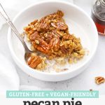 Warm bowl of pecan pie baked oatmeal drizzled with almond milk with text overlay that reads "Gluten-Free + Vegan-Friendly Pecan Pie Baked Oatmeal"
