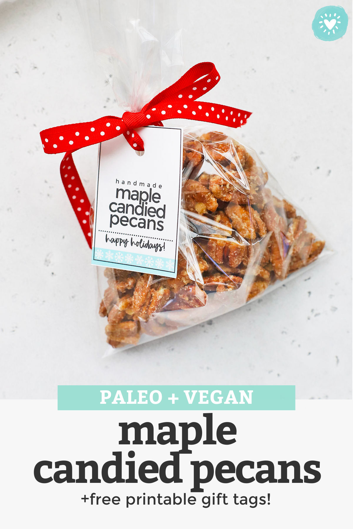 Maple Candied Pecans - These naturally sweetened candied pecans are PERFECT for snacking, holiday gifting, or topping your favorite salad. You'll love them as much as we do! Don't forget the free printable gift tag for gifting! (Paleo + Vegan) // Paleo Candied Pecans // Healthy Candied Pecans // Edible Gift // Holiday Gift // Printable Gift Tag // Cinnamon Candied Pecans #candiedpecans #ediblegift #holidaygift #gifttag