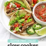 Front view of Slow Cooker Barbacoa Beef Tacos (Gluten-Free + Delicious) with text overlay that reads "Gluten-Free + Paleo Slow Cooker Barbacoa Beef"