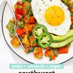 Close up overhead view of a plate of Southwest Sweet Potato Hash topped with an egg with text overlay of "paleo + Whole30 + vegan Southwest Sweet Potato Hash"
