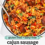 Overhead view of a bowl of Cajun Sausage and Rice Skillet on a white background with text overlay that reads "gluten-free + dairy-free Cajun sausage + rice skillet. An easy one-pan dinner!"