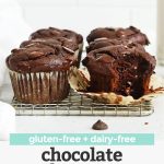 Front view of six gluten-free chocolate banana muffins on a cooling rack. One muffin is unwrapped with a bite taken out of it with text overlay that reads "gluten-free + dairy-free chocolate banana muffins"