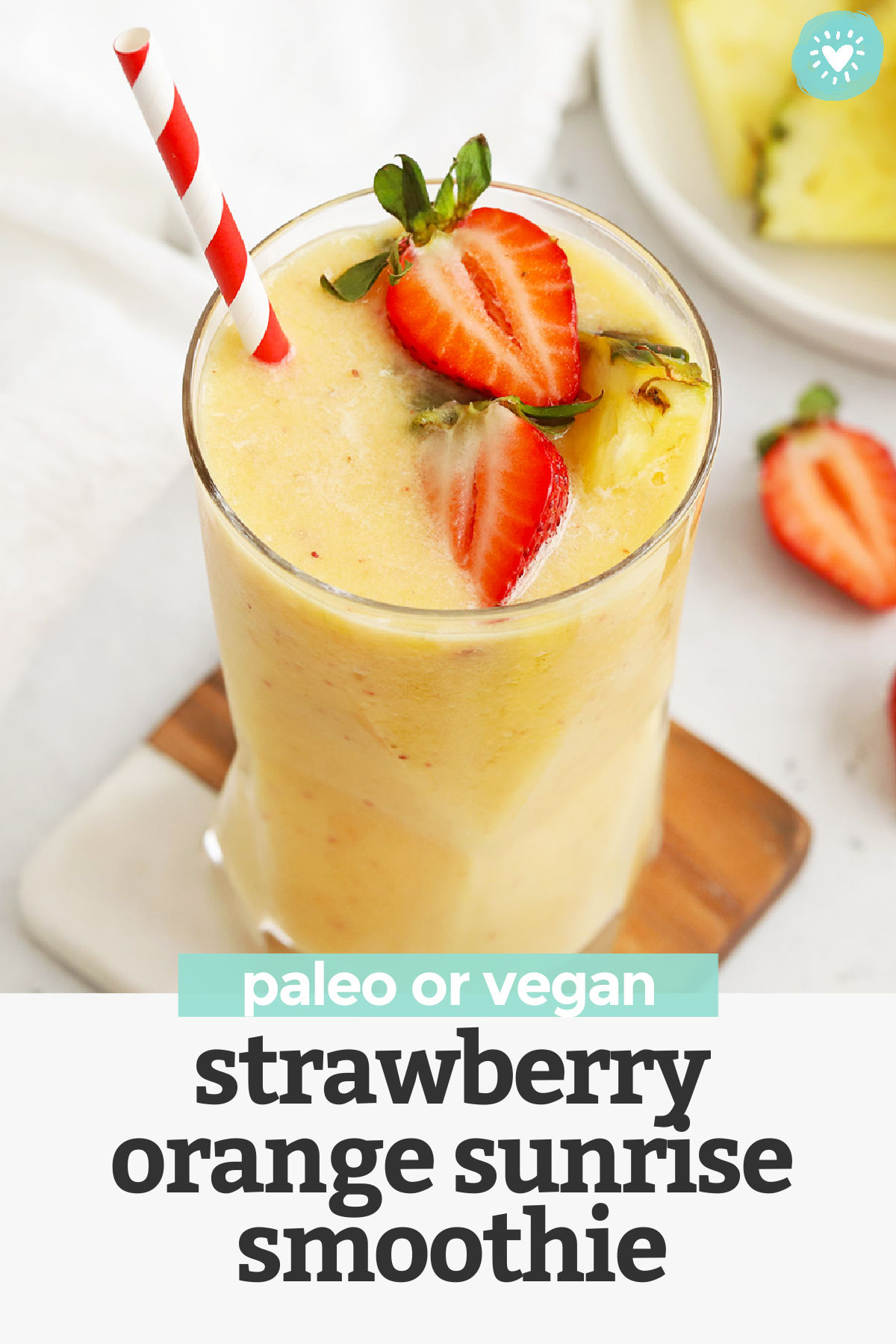 Strawberry Orange Sunrise Smoothie - This creamy strawberry mango pineapple smoothie has bright, fresh flavor that feels like taking your tastebuds on vacation! (Paleo or Vegan) // Strawberry Mango Smoothie // Strawberry Pineapple Smoothie // Strawberry Orange Smoothie // Healthy smoothie // healthy snack #paleo #vegan #smoothie