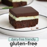 Front view of a gluten-free mint brownie square on a white plate with text overlay that reads "dairy-free friendly gluten free mint brownies: fudgy + rich + delicious!"