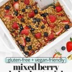 close up Overhead view of a pan of mixed berry baked oatmeal cut into slices with a small spatula with text overlay that reads "gluten-free + vegan-friendly mixed berry baked oatmeal: easy + cozy + berrylicious"