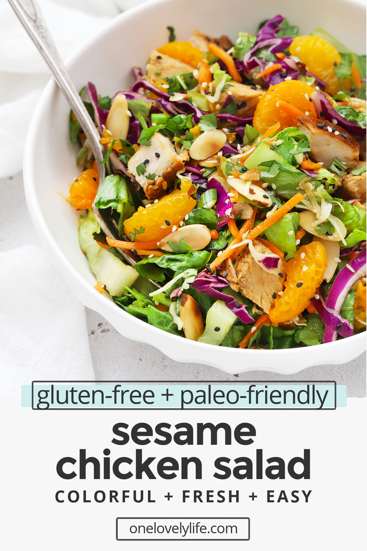 Sesame Chicken Salad - With tender sesame marinated chicken, colorful veggies, and a delicious sesame dressing, this sesame chicken salad is one of our favorite healthy dinners! (Gluten-Free, Paleo-Friendly) // Healthy sesame chicken salad // paleo sesame chicken salad // main dish salad // dinner salad // healthy dinner // healthy lunch