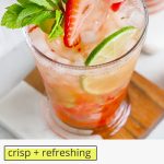 Front view of a non-alcoholic strawberry mint julep mocktail in a glass julep cup with text overlay that reads "crisp + refreshing virgin strawberry mint juleps"