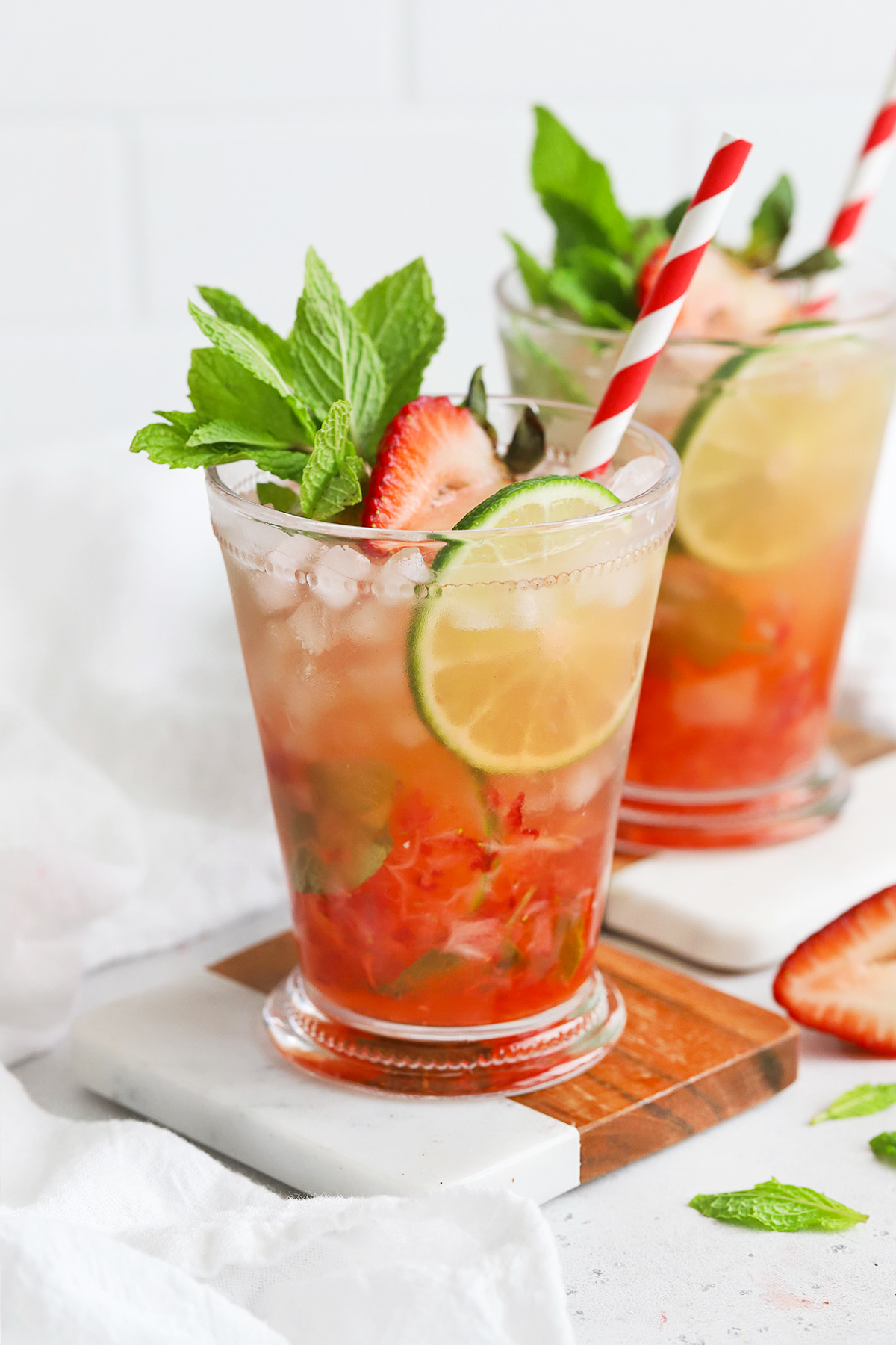Front view of Non-Alcoholic Strawberry Mint Juleps on coasters