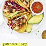 Overhead view of three honey lime chicken tacos with slaw on a white plate with text overlay that reads "gluten-free + easy honey lime chicken tacos: fresh + flavorful + fun"