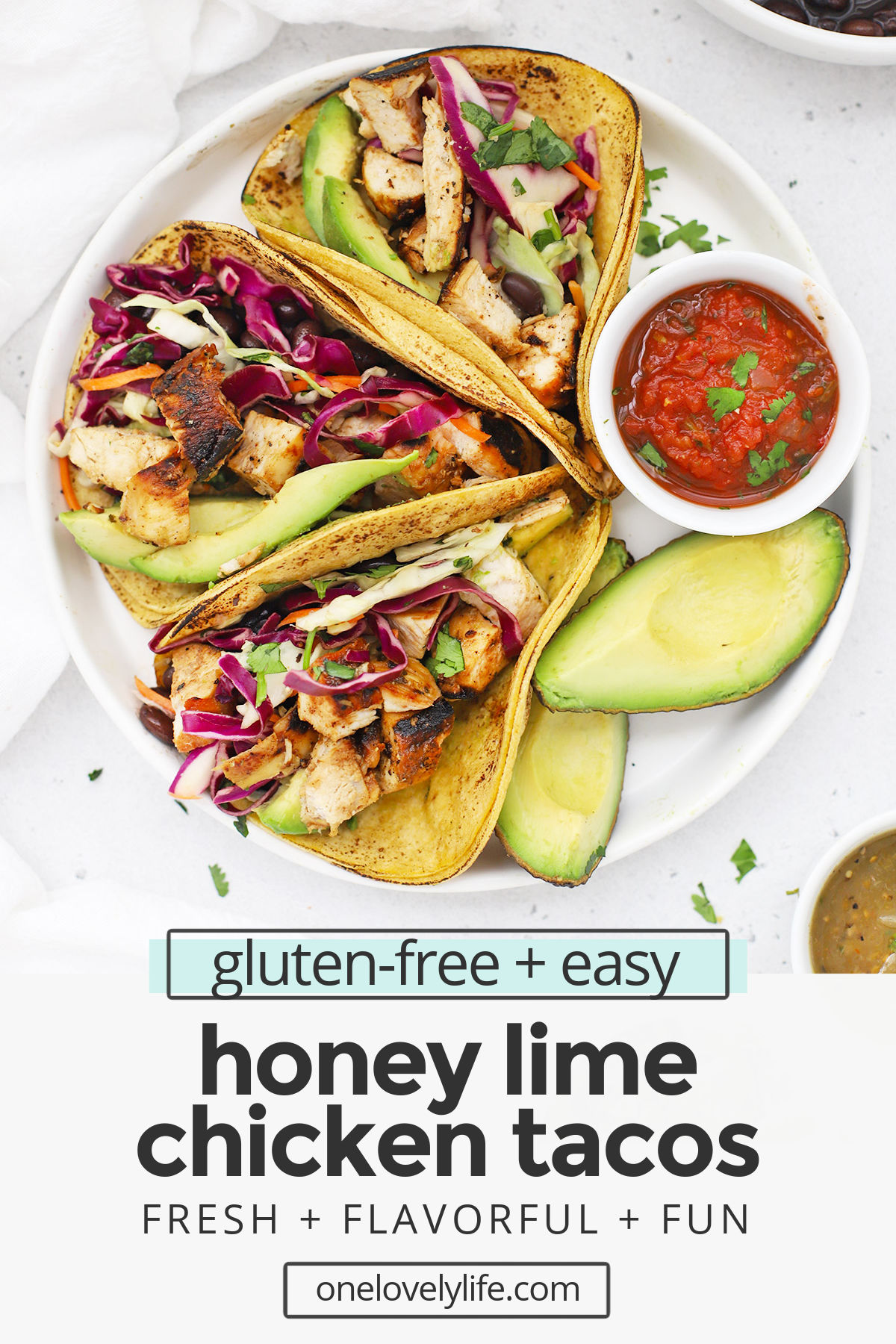 Honey Lime Chicken Tacos - Our honey lime chicken marinade gives these chicken tacos such delicious flavor. Don't miss our favorite toppings to add to these tasty tacos! (Gluten-Free) // Chicken Tacos recipe // Lime Chicken Tacos // Chili Lime Chicken Tacos // healthy chicken tacos // the best chicken tacos // grilled chicken tacos