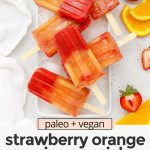 Overhead view of strawberry orange sunrise popsicles on a platter of ice with text overlay that reads "paleo & vegan Strawberry Orange Sunrise Popsicles: Easy + Healthy + Fresh"