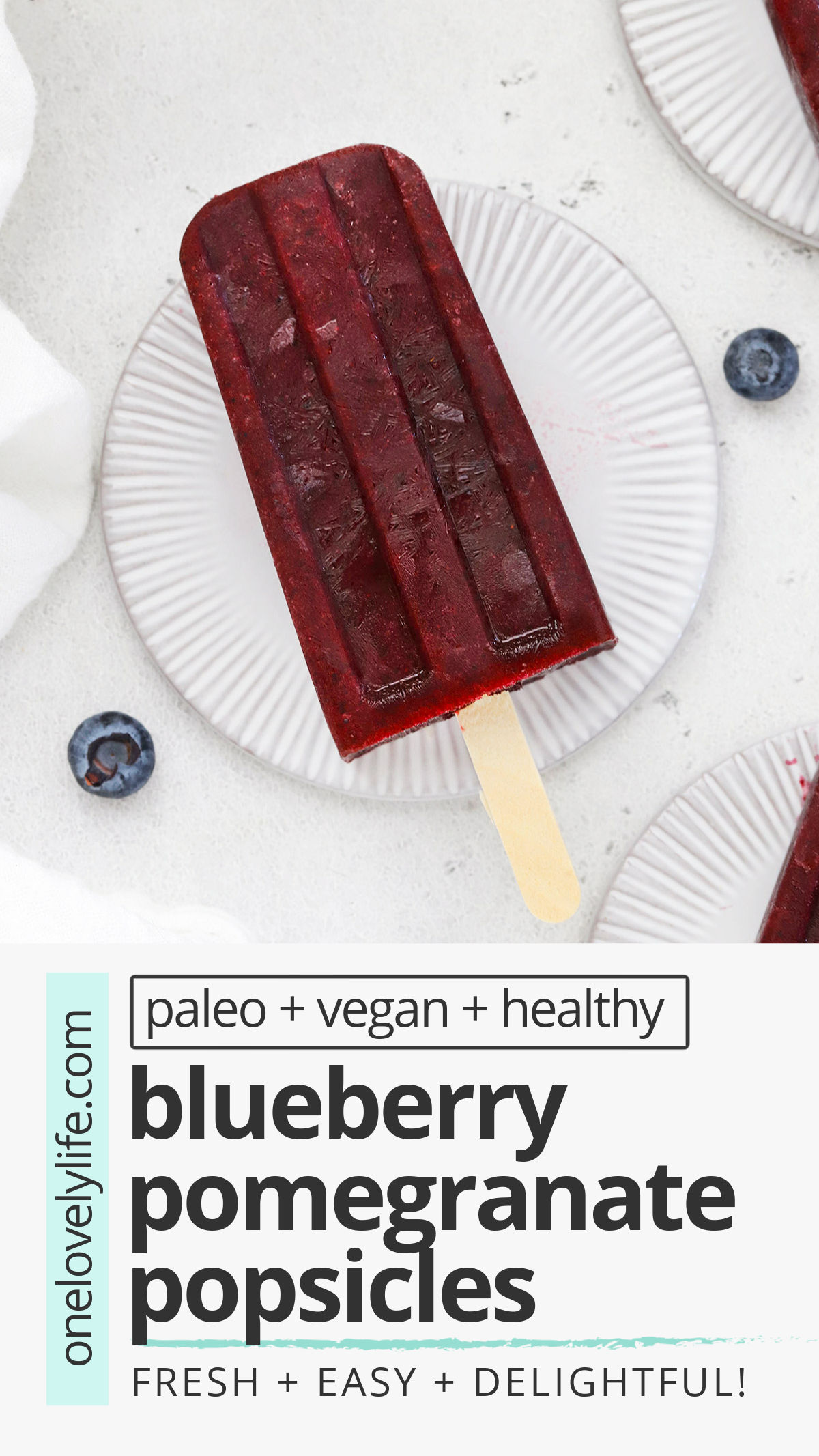Blueberry Pomegranate Popsicles - These healthy blueberry popsicles are made of 100% fruit and have a creamy sorbet-like texture you'll fall in love with! // Blueberry Popsicles No Sugar // Blueberry Popsicles Without Yogurt // Homemade Blueberry Popsicles // pomegranate popsicles // berry popsicles // healthy popsicles