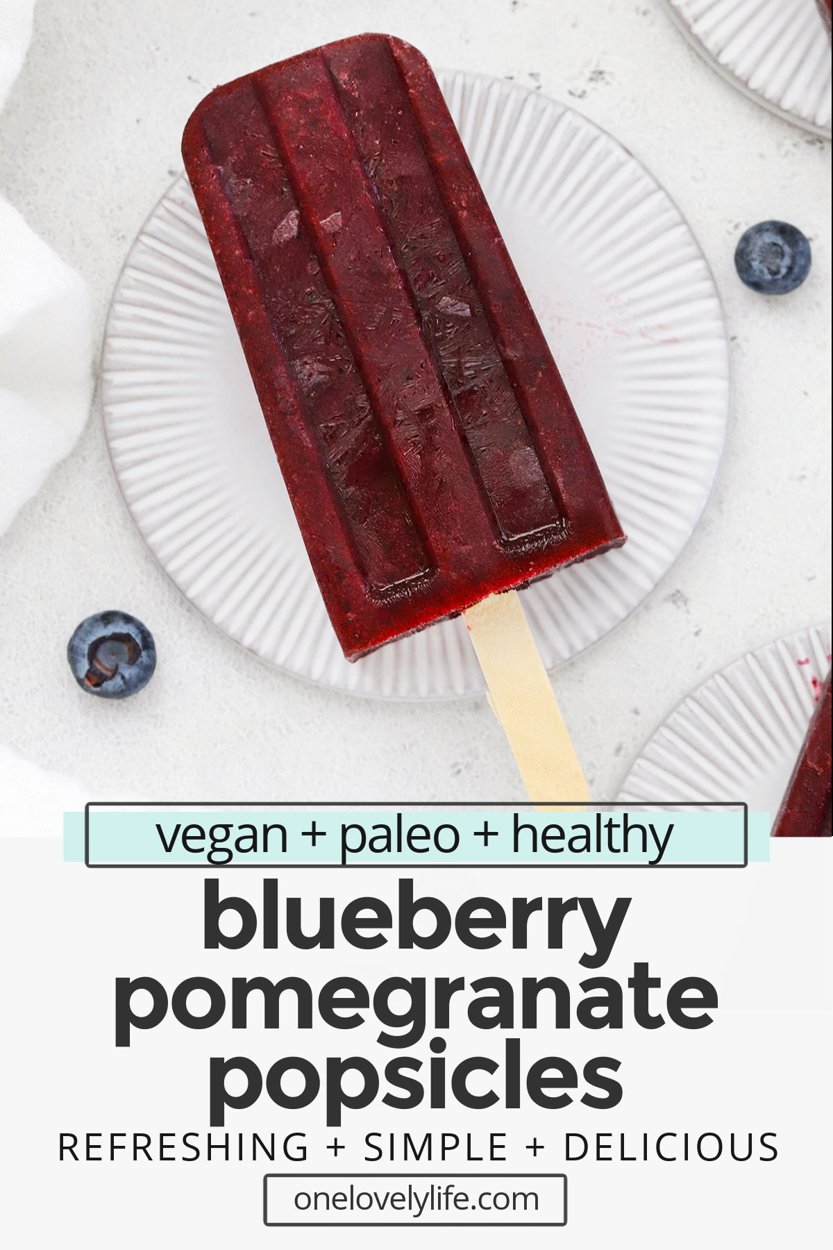 Blueberry Pomegranate Popsicles - These healthy blueberry popsicles are made of 100% fruit and have a creamy sorbet-like texture you'll fall in love with! // Blueberry Popsicles No Sugar // Blueberry Popsicles Without Yogurt // Homemade Blueberry Popsicles // pomegranate popsicles // berry popsicles // healthy popsicles