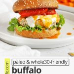 Front view of a buffalo chicken burger on a gluten-free bun with lettuce, tomato, buffalo sauce, and paleo ranch with text overlay that reads "paleo + whole30-friendly buffalo chicken burgers: quick + easy + healthy"