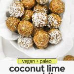 Overhead view of a bowl of coconut lime energy bites. Some of them dipped in coconut with text overlay that reads "vegan + paleo coconut lime energy bites: A healthy meal prep snack!"