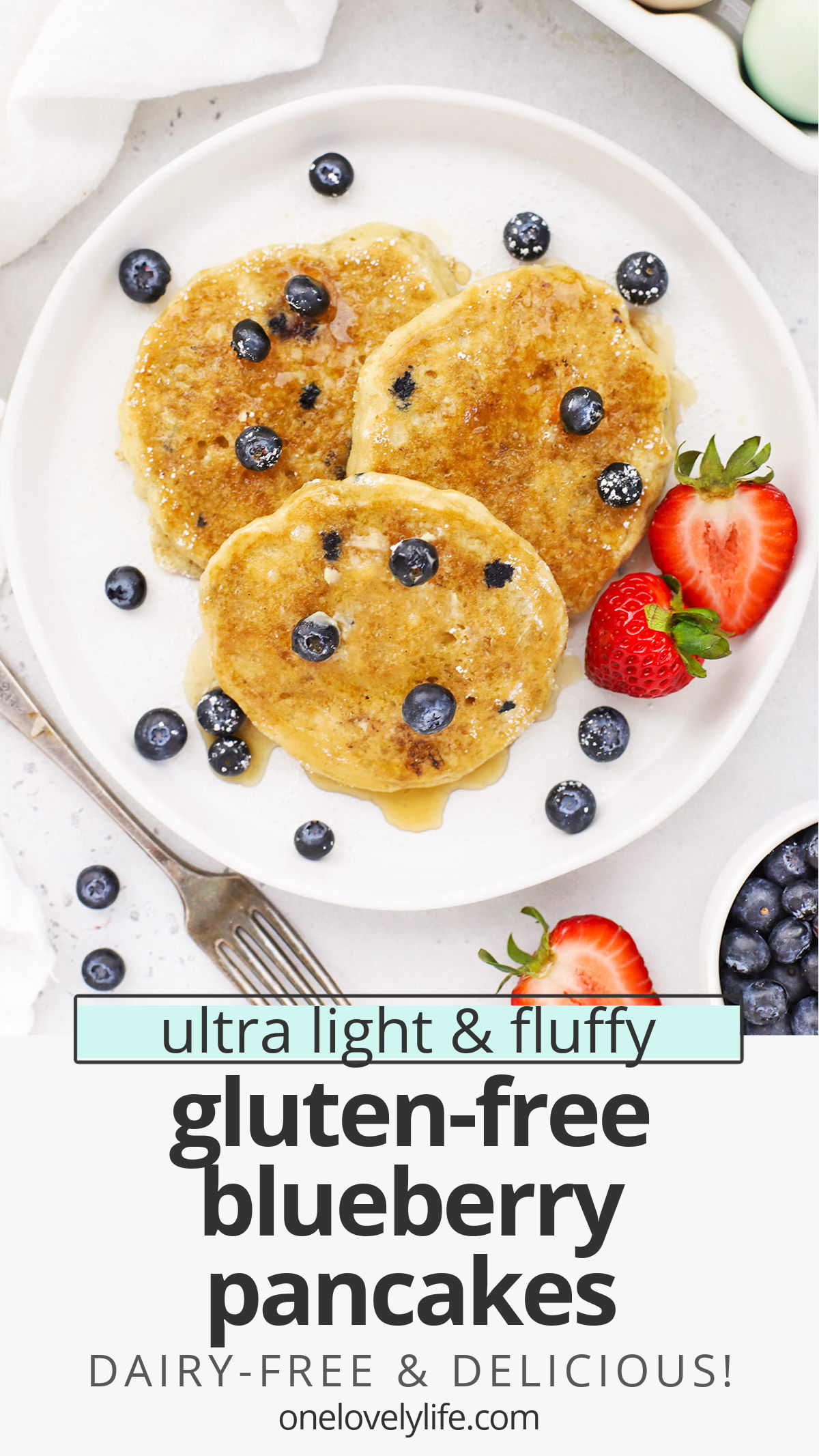 Fluffy Gluten-Free Blueberry Pancakes - These impossibly light, fluffy blueberry buttermilk pancakes are gluten-free, dairy-free & absolutely delicious. // gluten free blueberry pancakes recipe // dairy free blueberry pancakes // the best gluten-free blueberry pancakes // Gluten Free buttermilk blueberry pancakes #pancakes #blueberry #glutenfree #glutenfreepancakes