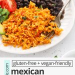 Front view of Mexican rice served with black beans with text overlay that reads "gluten-free + vegan-friendly Mexican Restaurant-Style Rice: Perfect for Beans & Rice!"