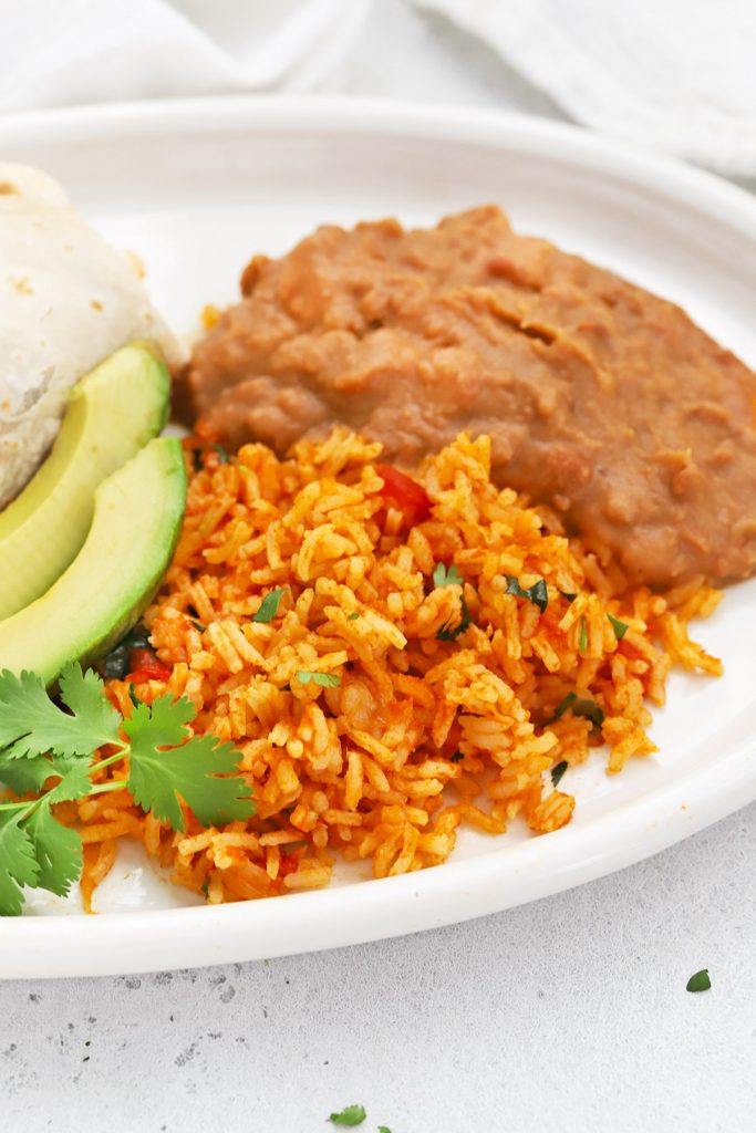 Front view of Mexican rice served with refried beans