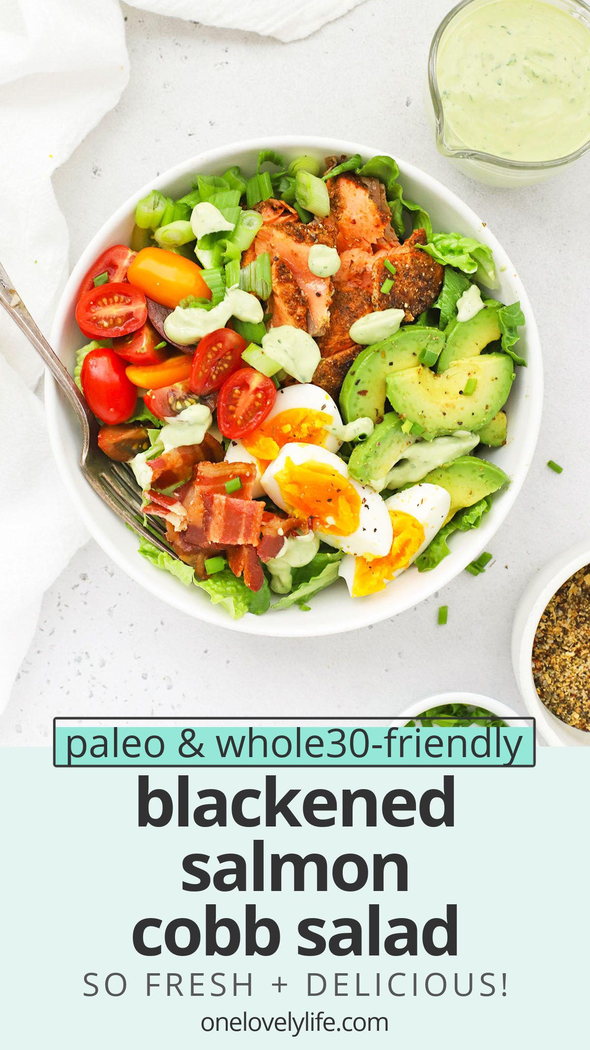 Blackened Salmon Cobb Salad - This salmon Cobb salad full of colorful veggies and finished with a creamy avocado green goddess dressing we can't get enough of! (Paleo, Whole30-Friendly) // Salmon Salad // Blackened Salmon Recipe // Salmon Cobb Recipe // Healthy Dinner // dinner salad // summer salad // green goddess salad // the best cobb salad // blackened cobb salad