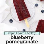 overhead view of healthy blueberry pomegranate popsicles