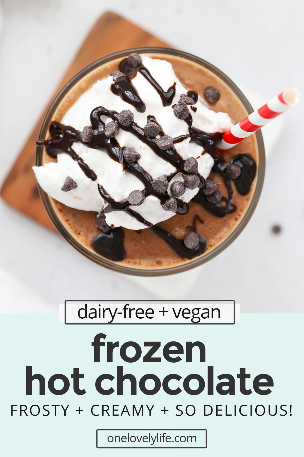 Vegan Frozen Hot Chocolate - This dairy-free frozen hot chocolate is frost, creamy, and so delicious with a swirl of whipped cream and some chocolate on top. You won't want to miss it! // Paleo Frozen Hot Chocolate // Healthy Frozen Hot Chocolate recipe // easy frozen hot chocolate // vegan serendipity frozen hot chocolate // homemade frozen hot chocolate