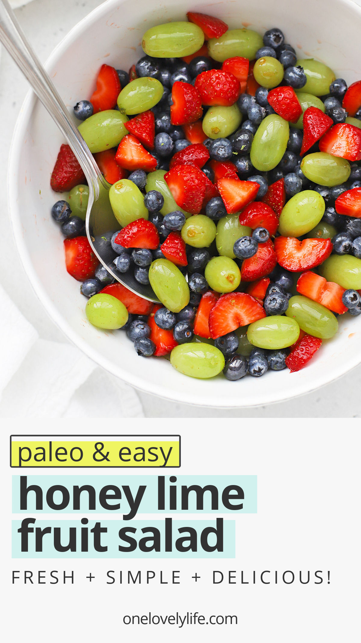 Honey Lime Fruit Salad is my favorite side dish. It's perfect for weeknight dinners, baby or wedding showers, barbecues, and more! // honey lime fruit salad recipe // healthy fruit salad // paleo fruit salad // fruit salad recipe // honey lime dressing